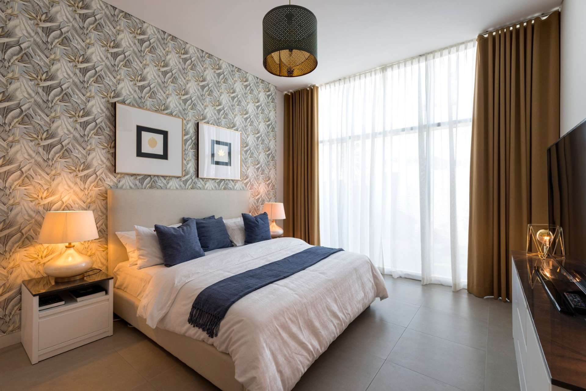 Modern bedroom in La Riviera, JVC apartment with elegant decor and natural light