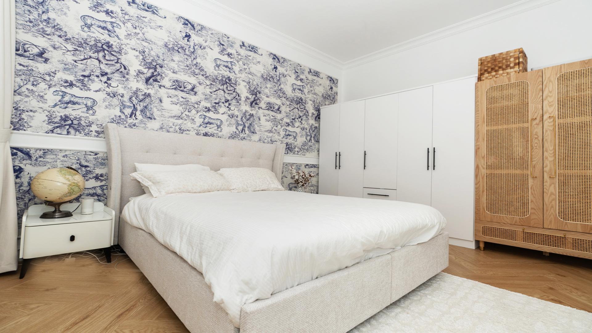 "Elegant bedroom in fully upgraded Al Barsha South apartment, Syann Park 1, for sale.",Modern bedroom in upgraded Al Barsha South apartment, featuring stylish decor and ample storage