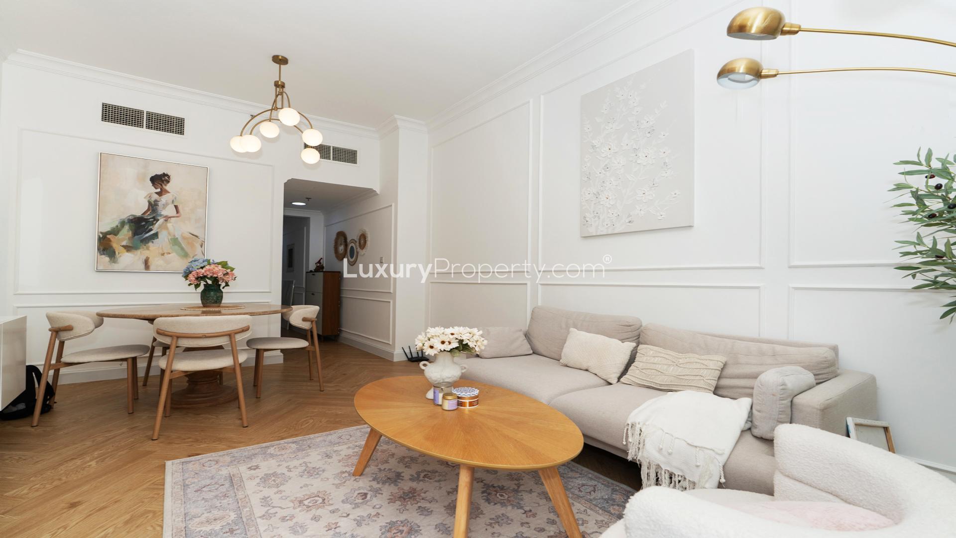 Modern living room in fully upgraded Al Barsha South apartment, featuring elegant decor and furniture