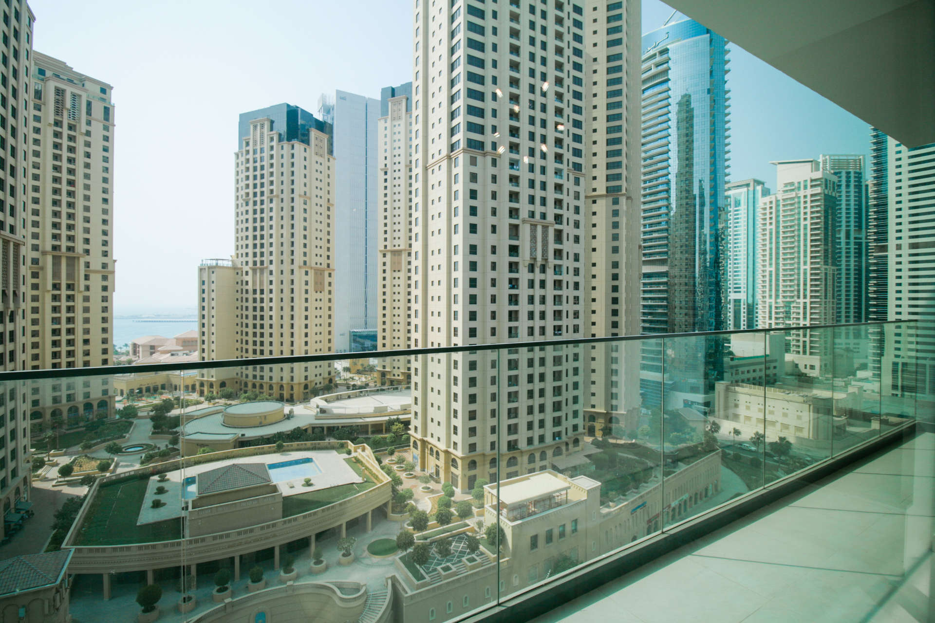 Modern living room with balcony views at LIV Residence, Dubai Marina apartment for sale