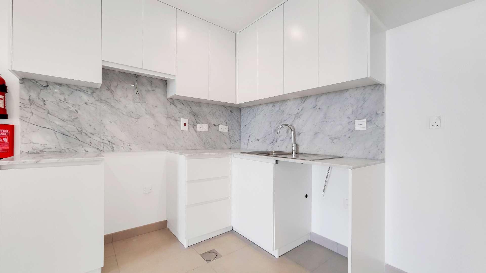 Modern one-bedroom apartment exterior in Madinat Jumeirah Living, Umm Suqeim, for sale