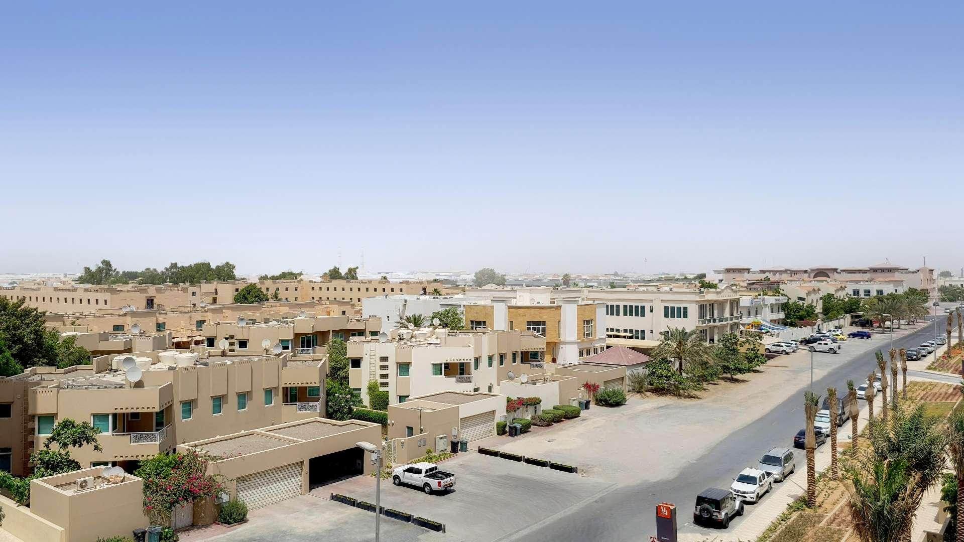 Modern open-plan kitchen and living area in Madinat Jumeirah one-bedroom apartment