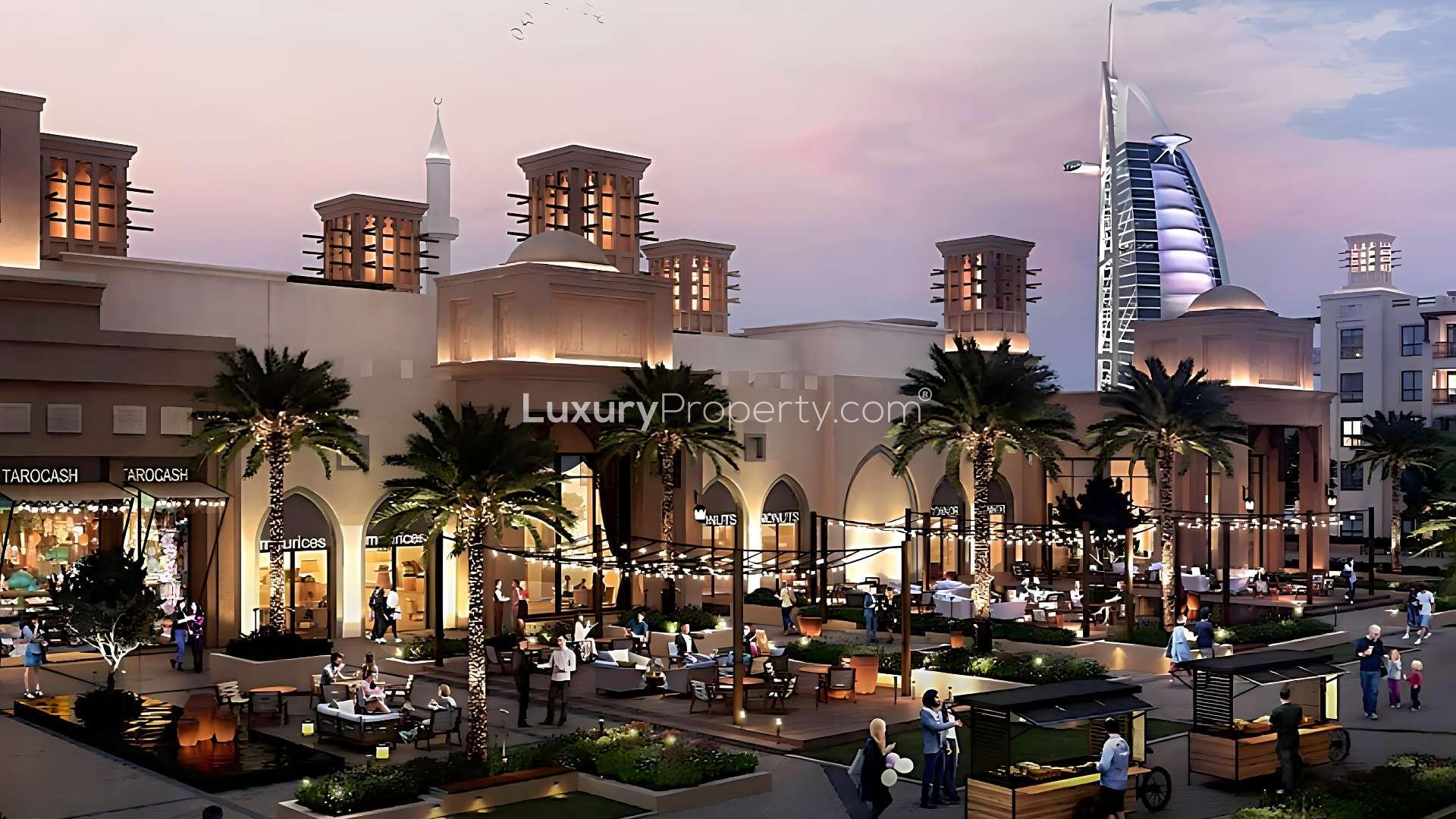 Contemporary bedroom in Madinat Jumeirah Living apartment, featuring modern decor and balcony view