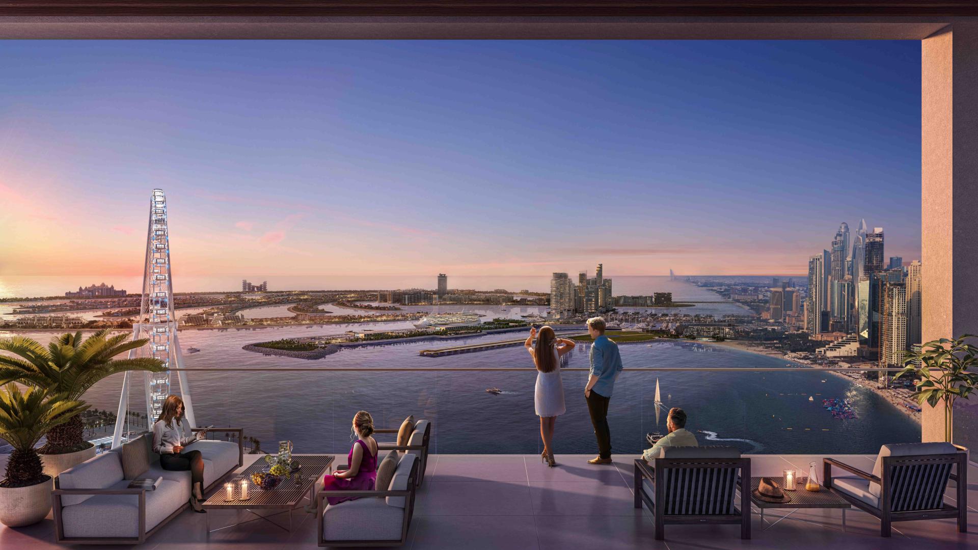 High-floor Bluewaters Bay apartment balcony with stunning Dubai skyline and sea views