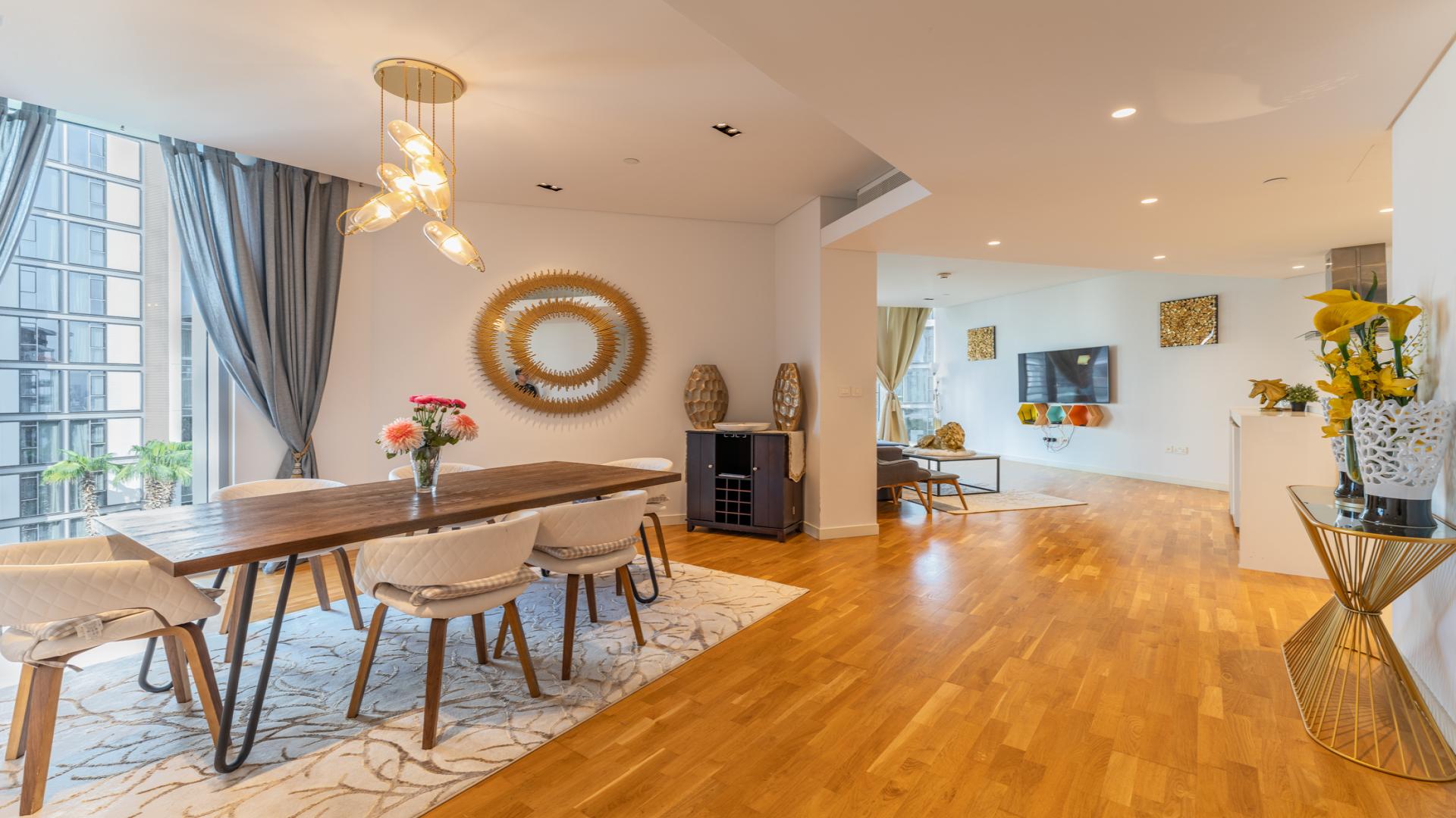 Modern living room in Bluewaters sea view apartment with stylish decor and natural light