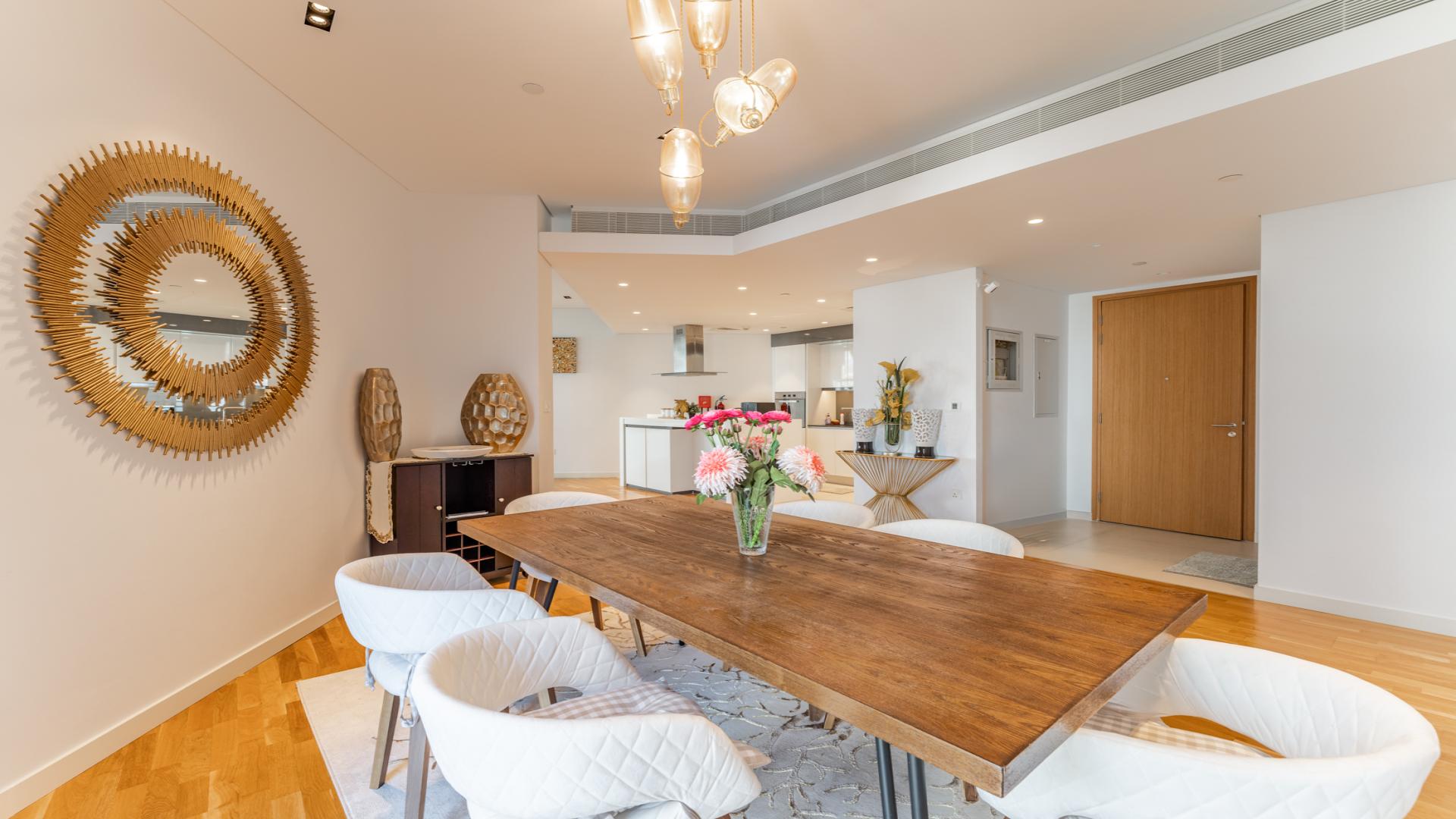 Elegant dining and living area in Bluewaters 1-bedroom sea view apartment for sale