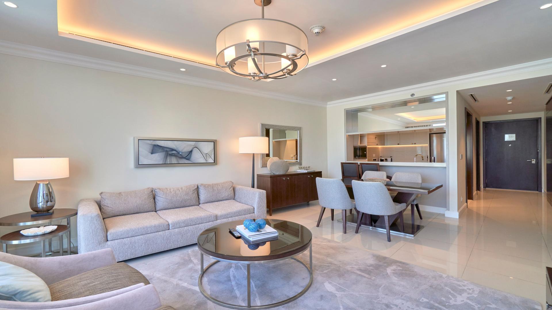 Furnished living room in Downtown Dubai apartment with Burj Khalifa view, modern decor