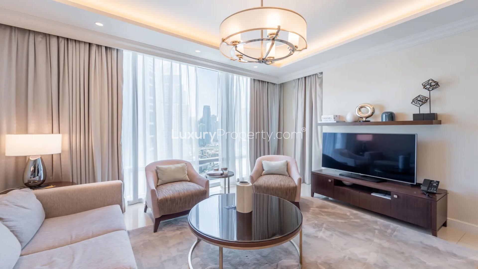 Modern living room in 1-bed apartment, Fountain Views, Downtown Dubai, elegant decor, large windows