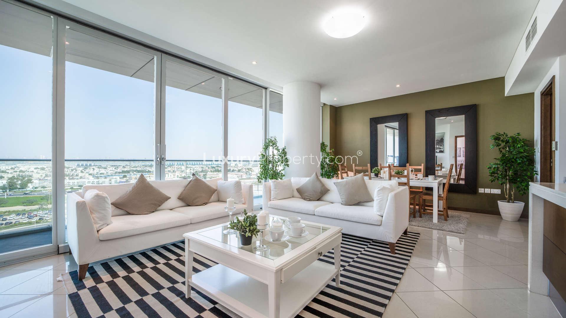 Modern open-plan kitchen and living area in luxury Marsa Plaza apartment, Dubai Festival City