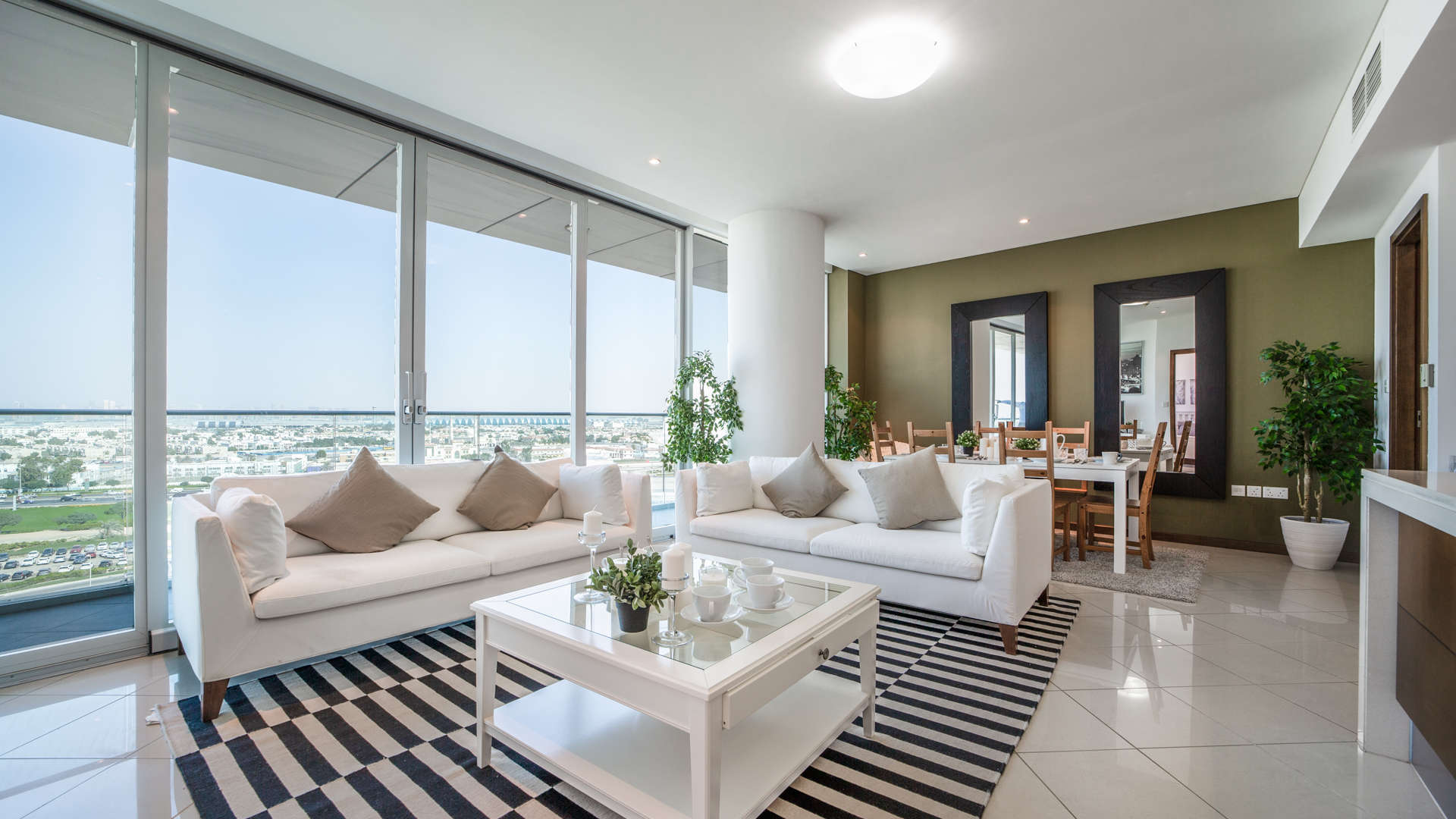 Modern open-plan kitchen and living area in luxury Marsa Plaza apartment, Dubai Festival City