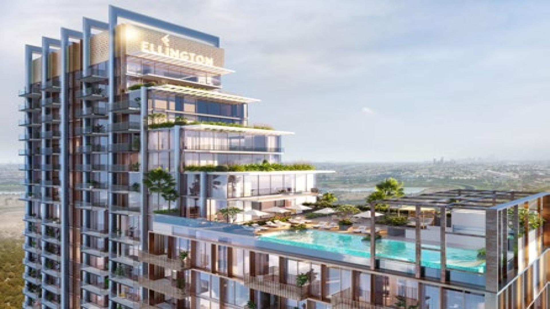 Modern bedroom in The Highbury apartment, Mohammed Bin Rashid City, featuring elegant decor and balcony