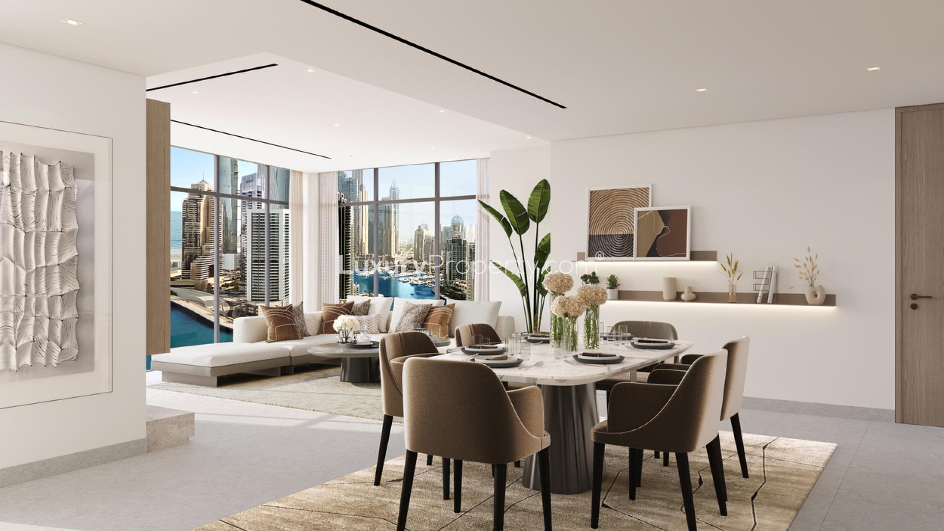 Luxurious pool area at LIV Waterside apartment, Dubai Marina, featuring sun loungers and cabanas