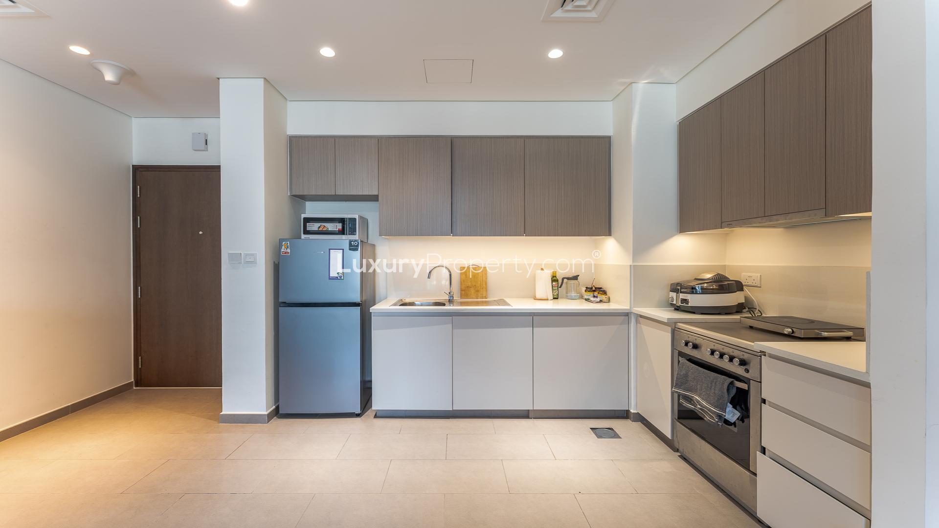 Hallway view of bedroom and bathroom in Park Heights apartment, Dubai Hills Estate