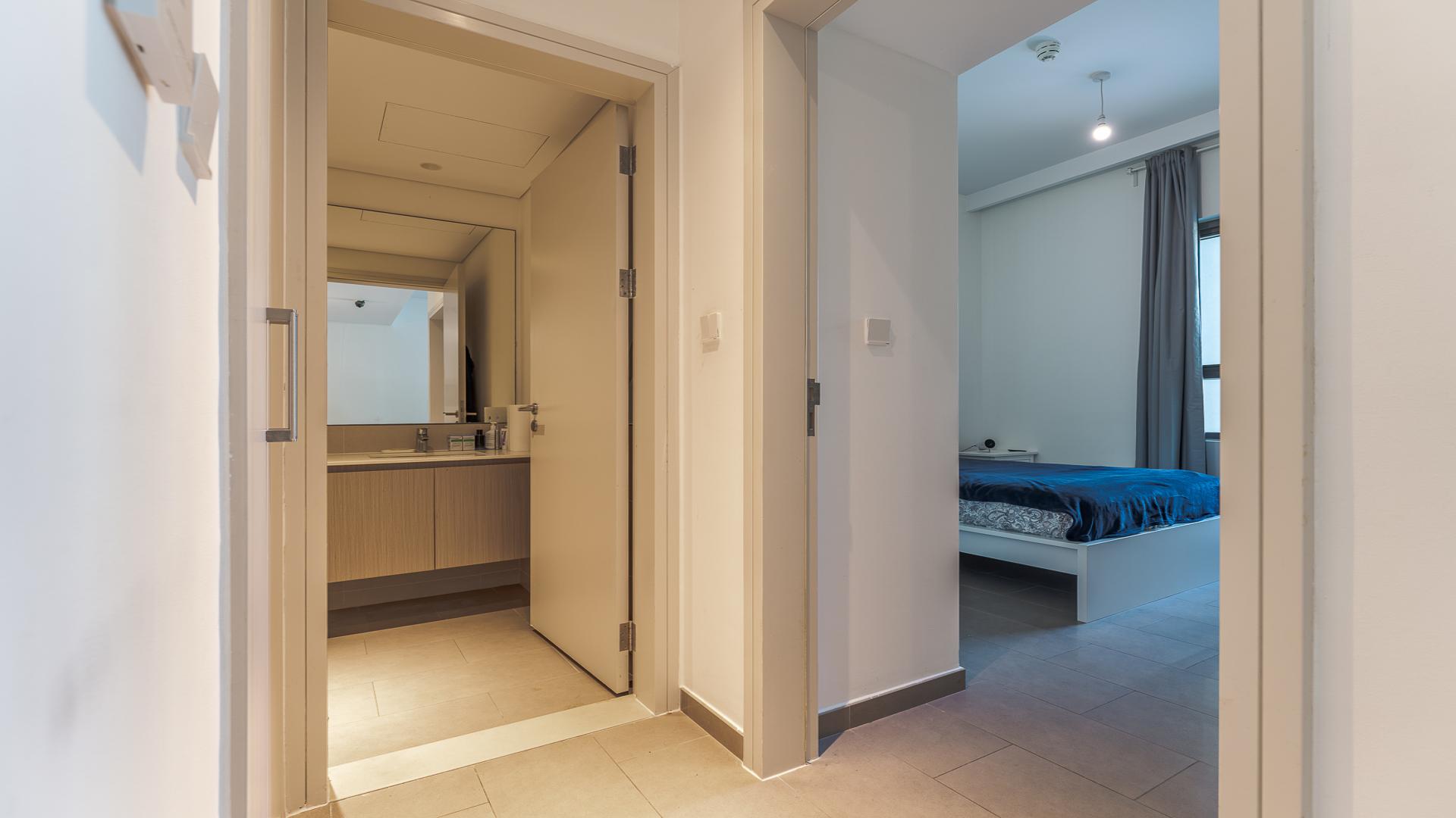 Modern living room and kitchen in Park Heights, Dubai Hills Estate 1-bedroom apartment for sale