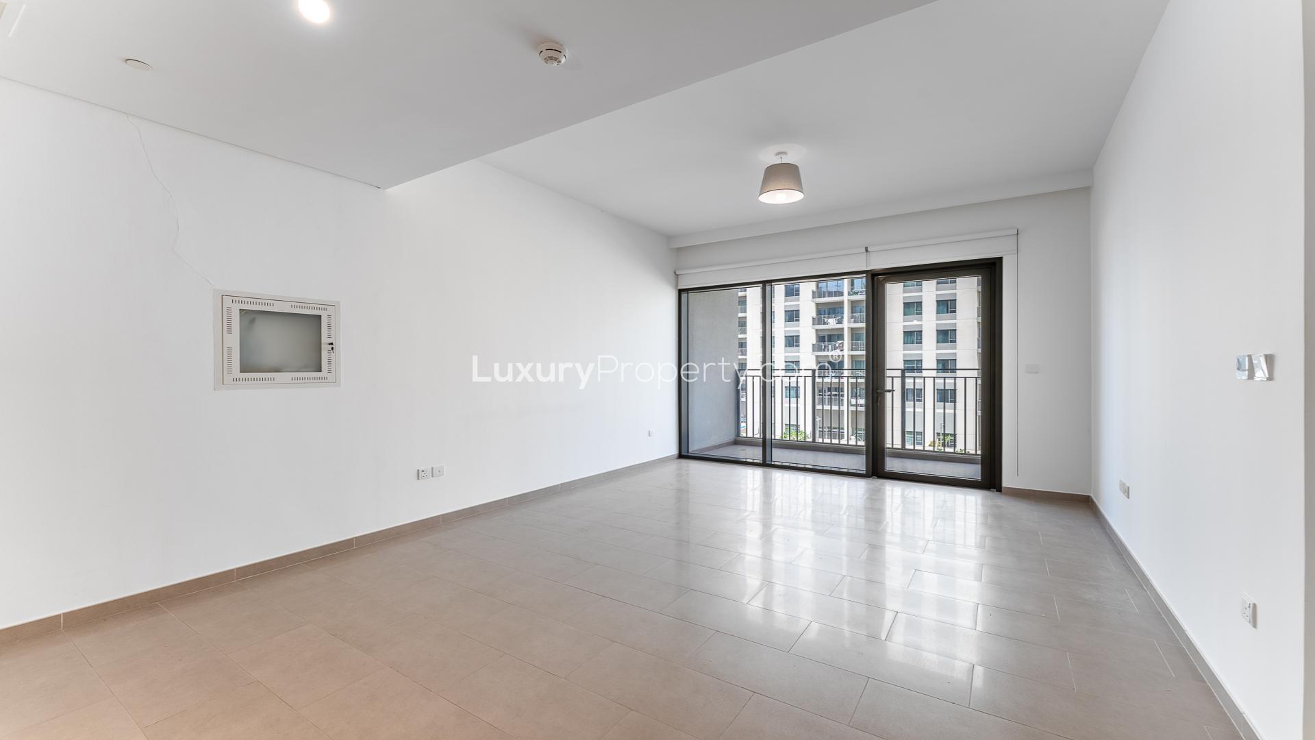 Pool view from Park Heights 1 apartment, Dubai Hills Estate, showcasing modern residential buildings