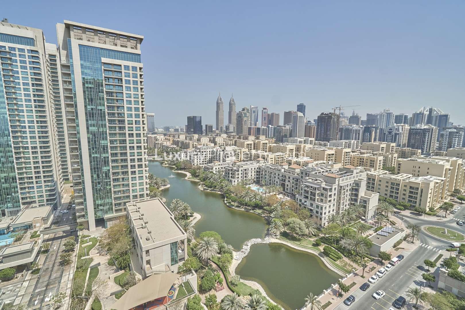 N/A,Balcony view from 1-bedroom apartment in Mosela Tower, The Views, Dubai, overlooking canal