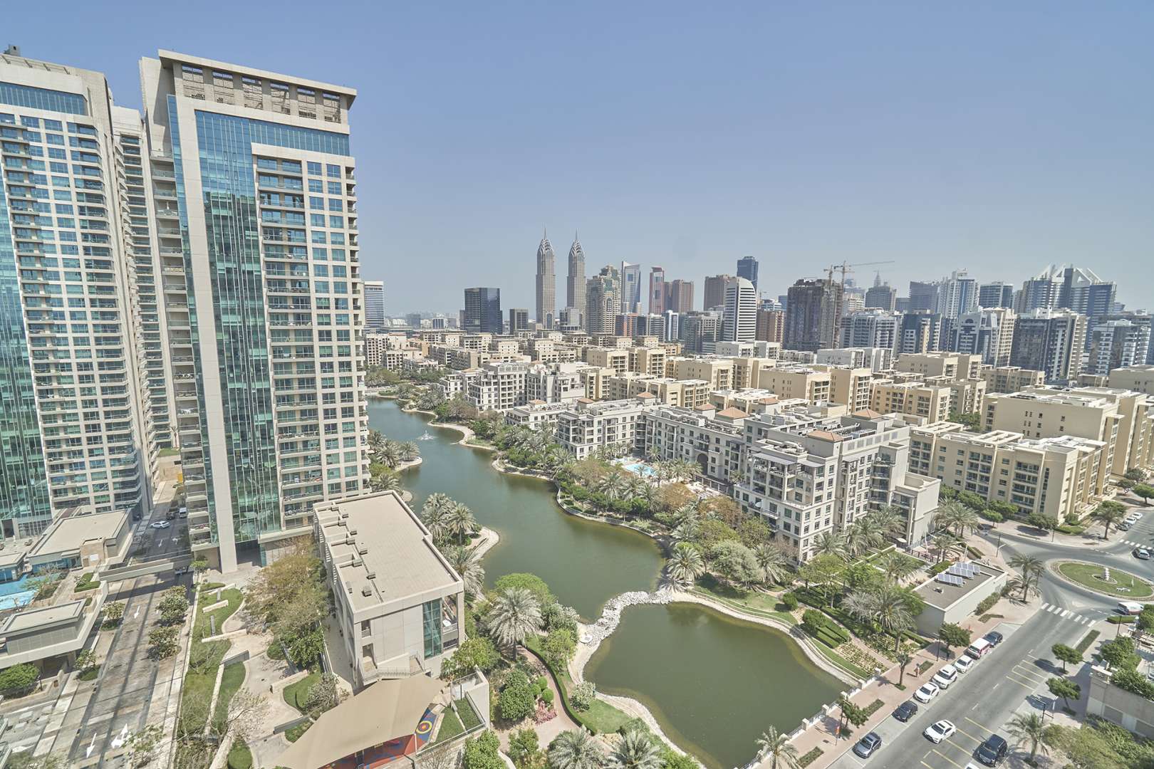 N/A,Balcony view from 1-bedroom apartment in Mosela Tower, The Views, Dubai, overlooking canal