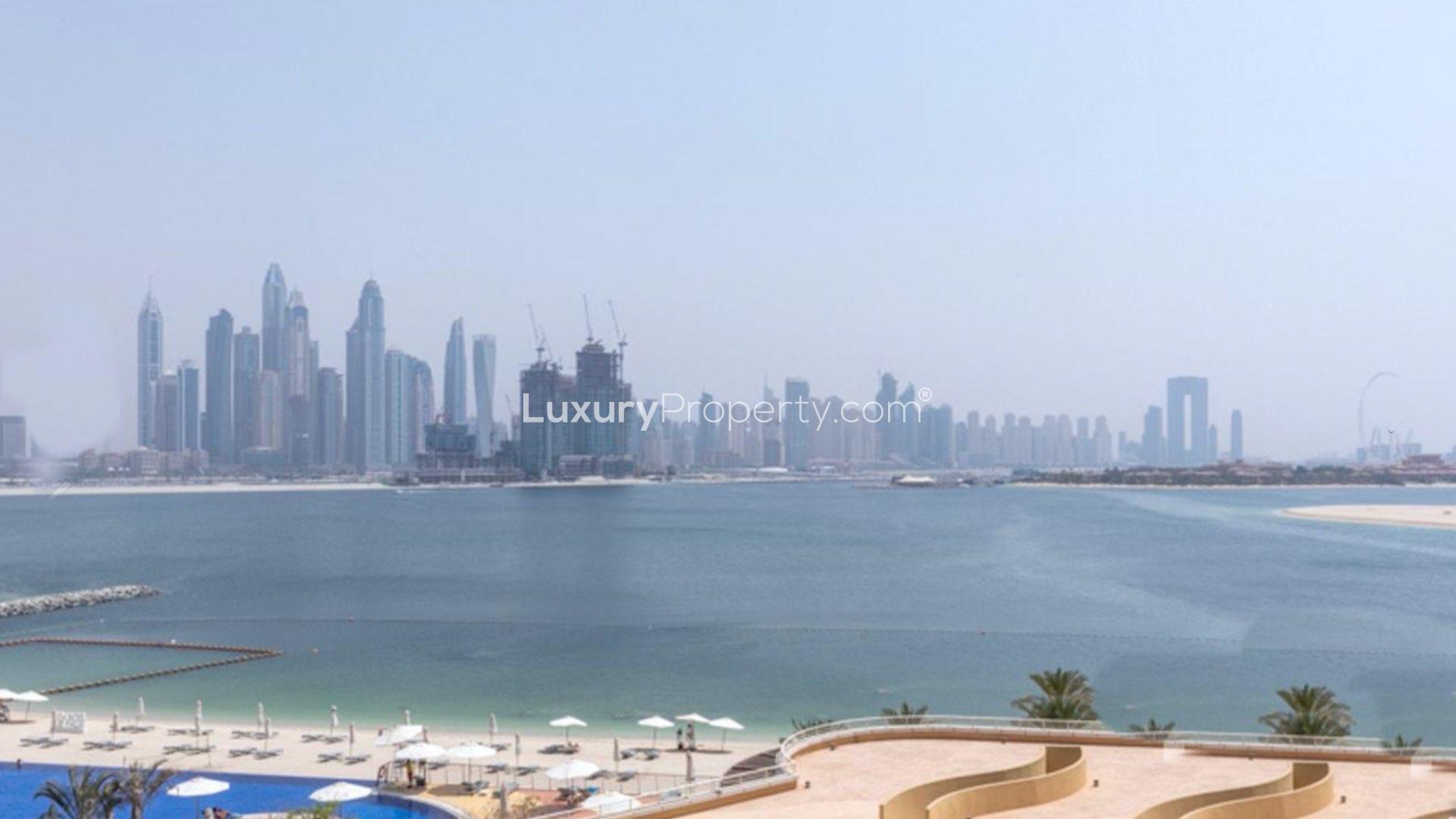 Modern bathroom in Oceana apartment, Palm Jumeirah, featuring dual sinks and a bathtub