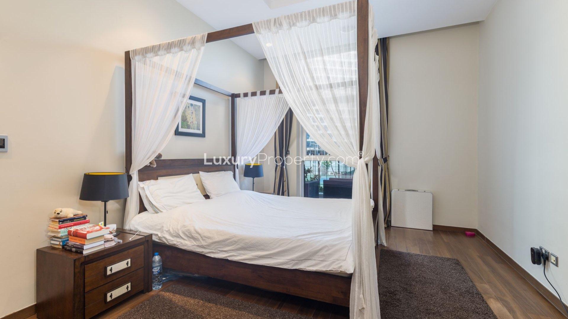 Spacious living area in Palm Jumeirah apartment with modern furnishings and large windows