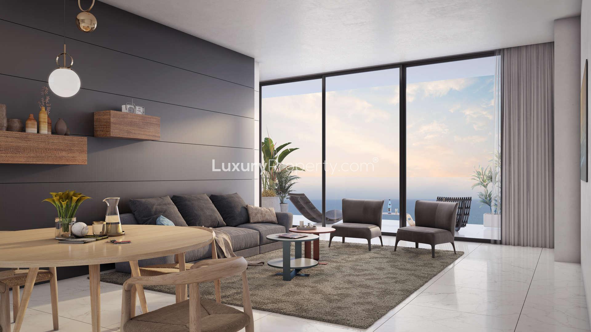 Ultramodern one-bedroom apartment tower at sunset, Olympic Resort, Limassol