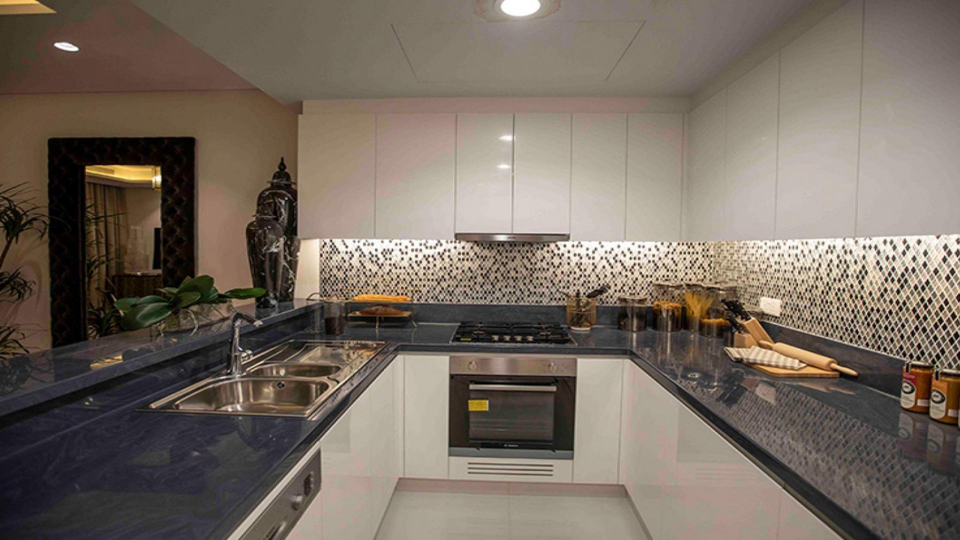 Luxurious dining and living area in Paramount Tower apartment, Business Bay, high floor