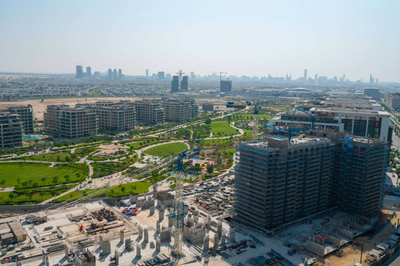 High-floor apartment view over Dubai Hills Estate skyline and Park Heights community