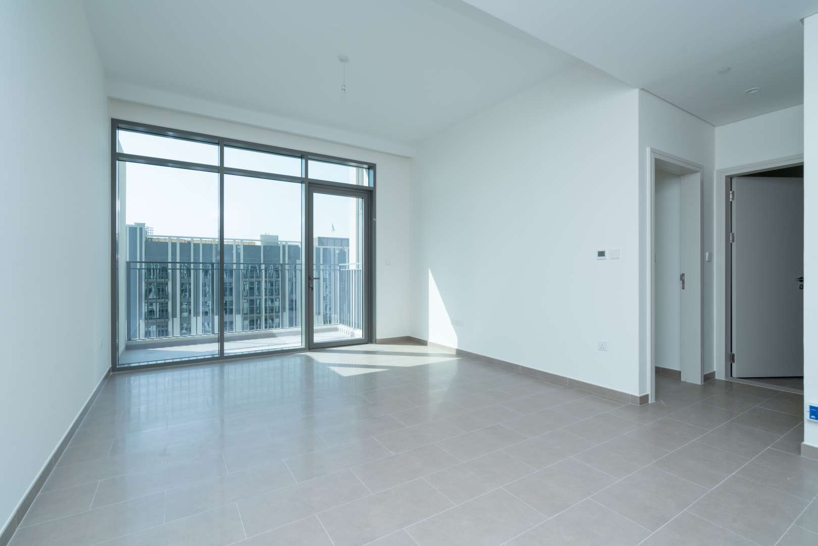 High-floor apartment view of Dubai Hills Estate and Park Heights construction site
