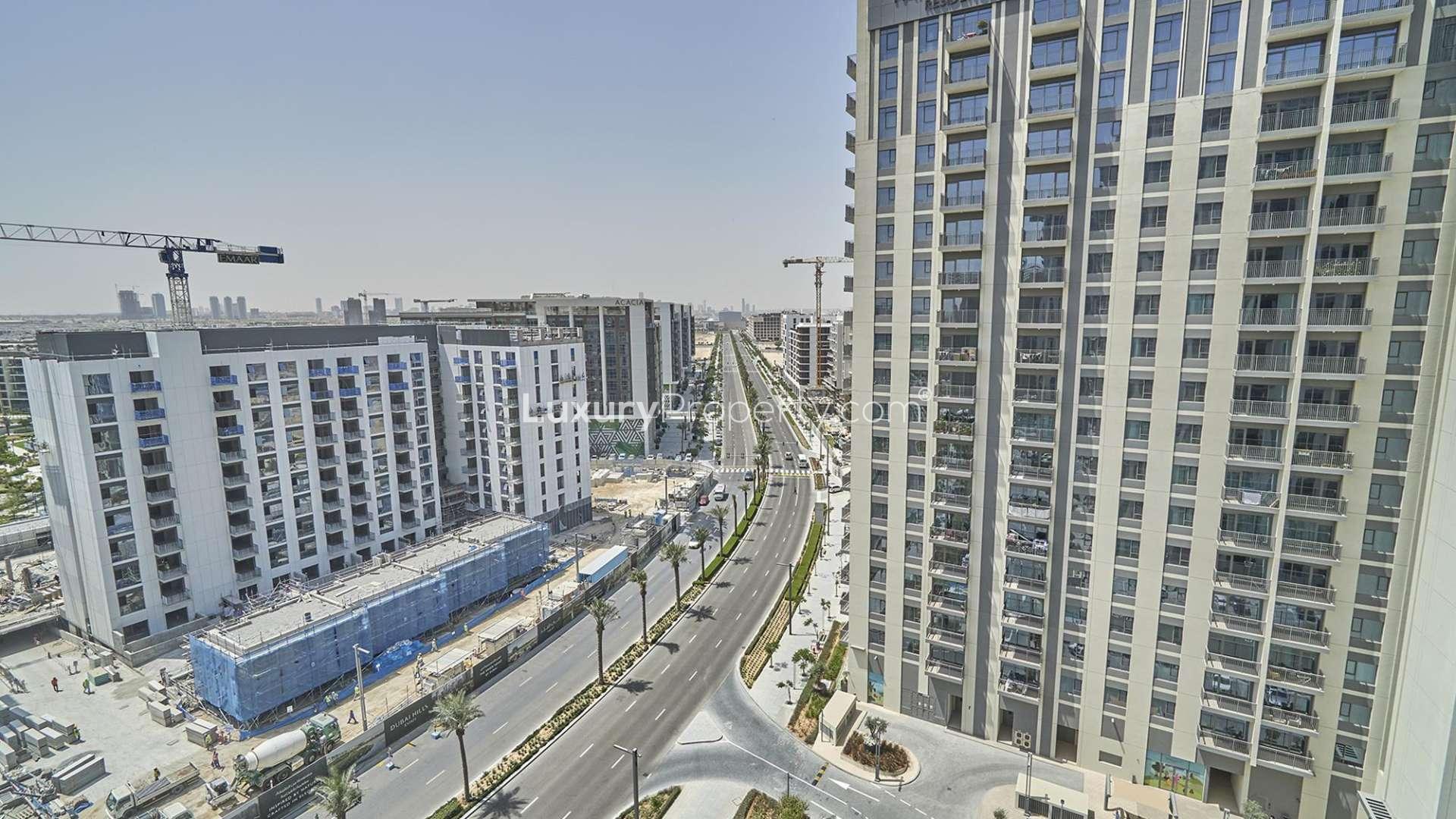 Tall residential building exterior in Park Heights 2, Dubai Hills Estate, featuring balconies