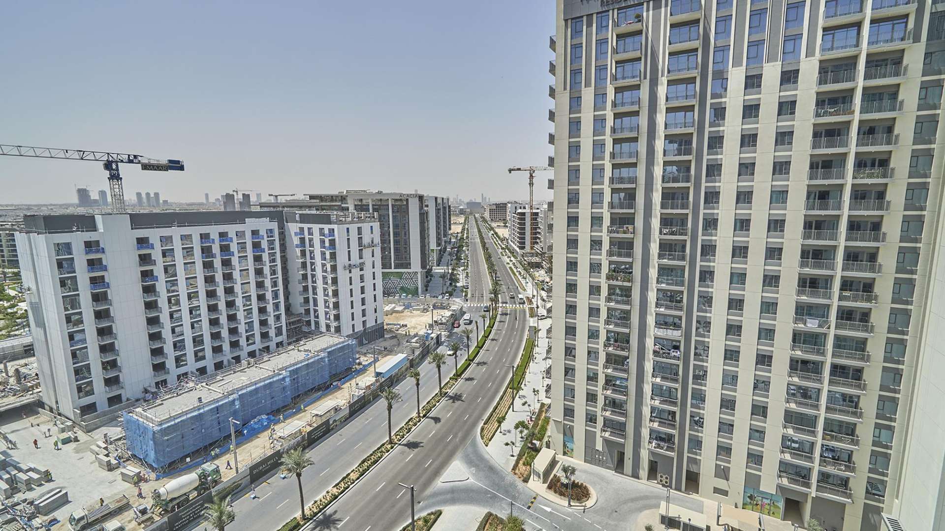 Tall residential building exterior in Park Heights 2, Dubai Hills Estate, featuring balconies