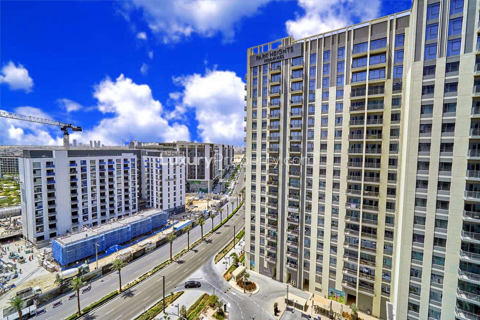 Aerial view of Park Heights apartment building with pool in Dubai Hills Estate