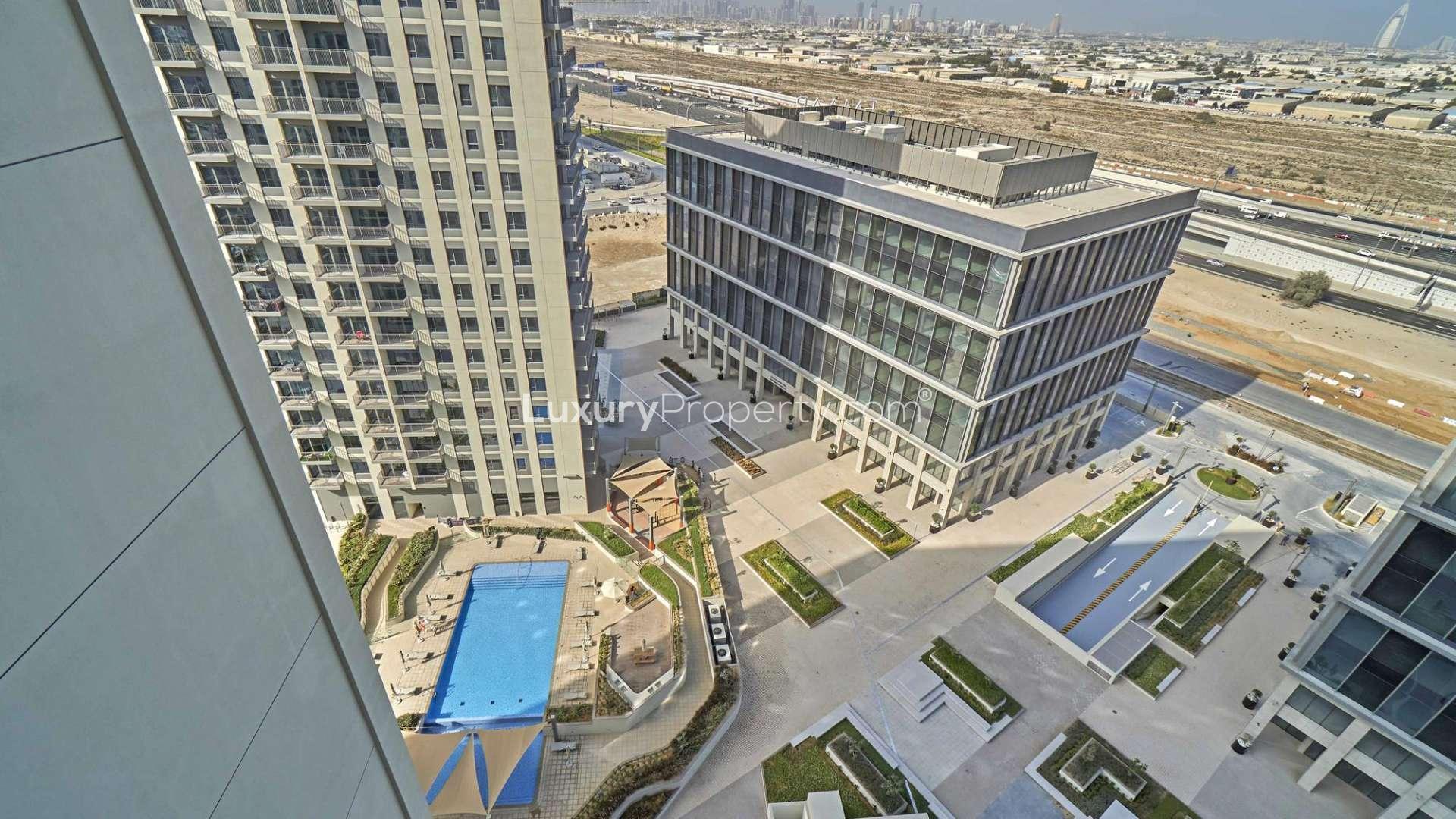High-floor apartment interior with balcony view in Park Heights, Dubai Hills Estate