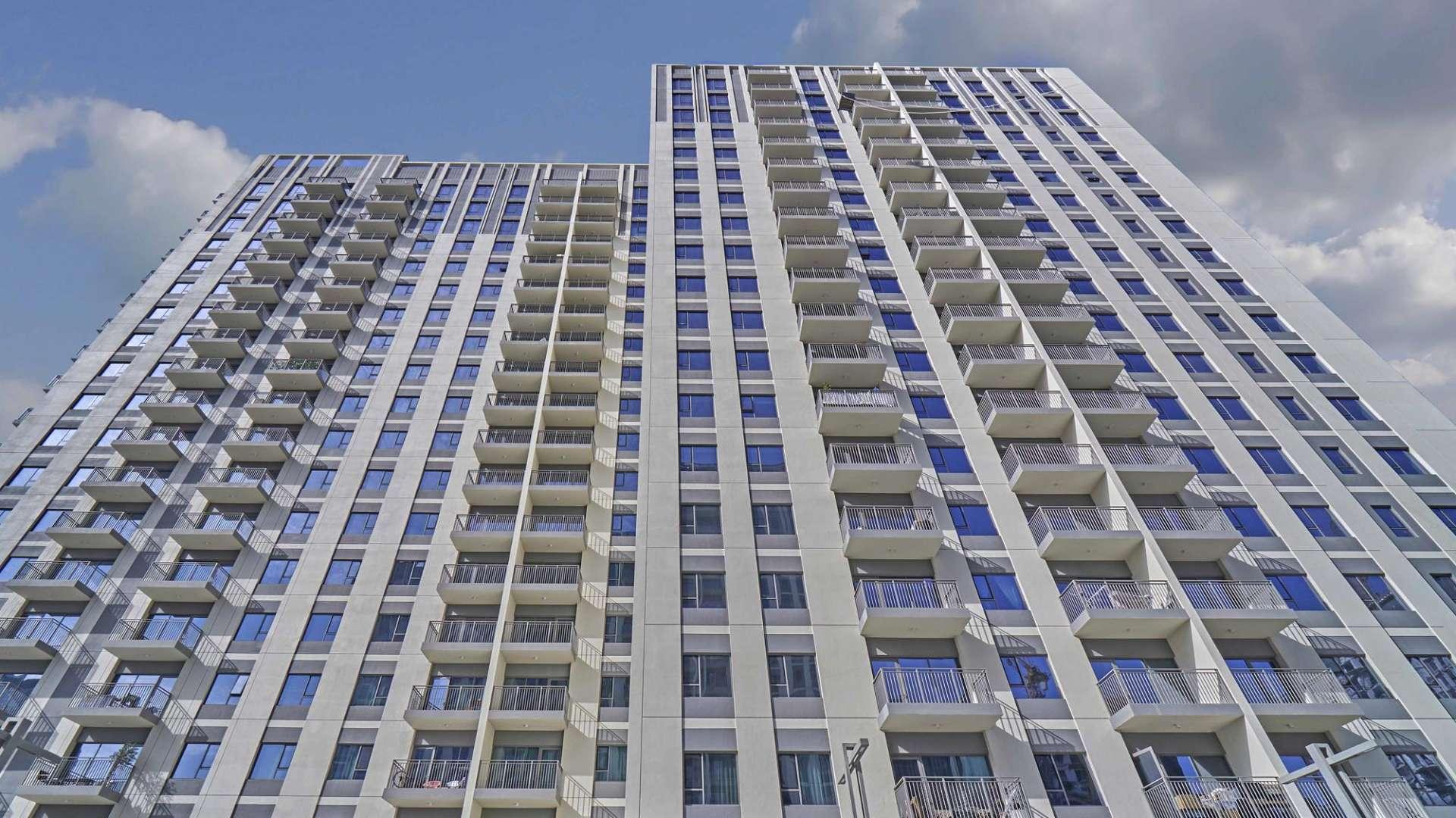 High floor apartment view, Dubai Hills Estate, Park Heights, with pool and surrounding landscape