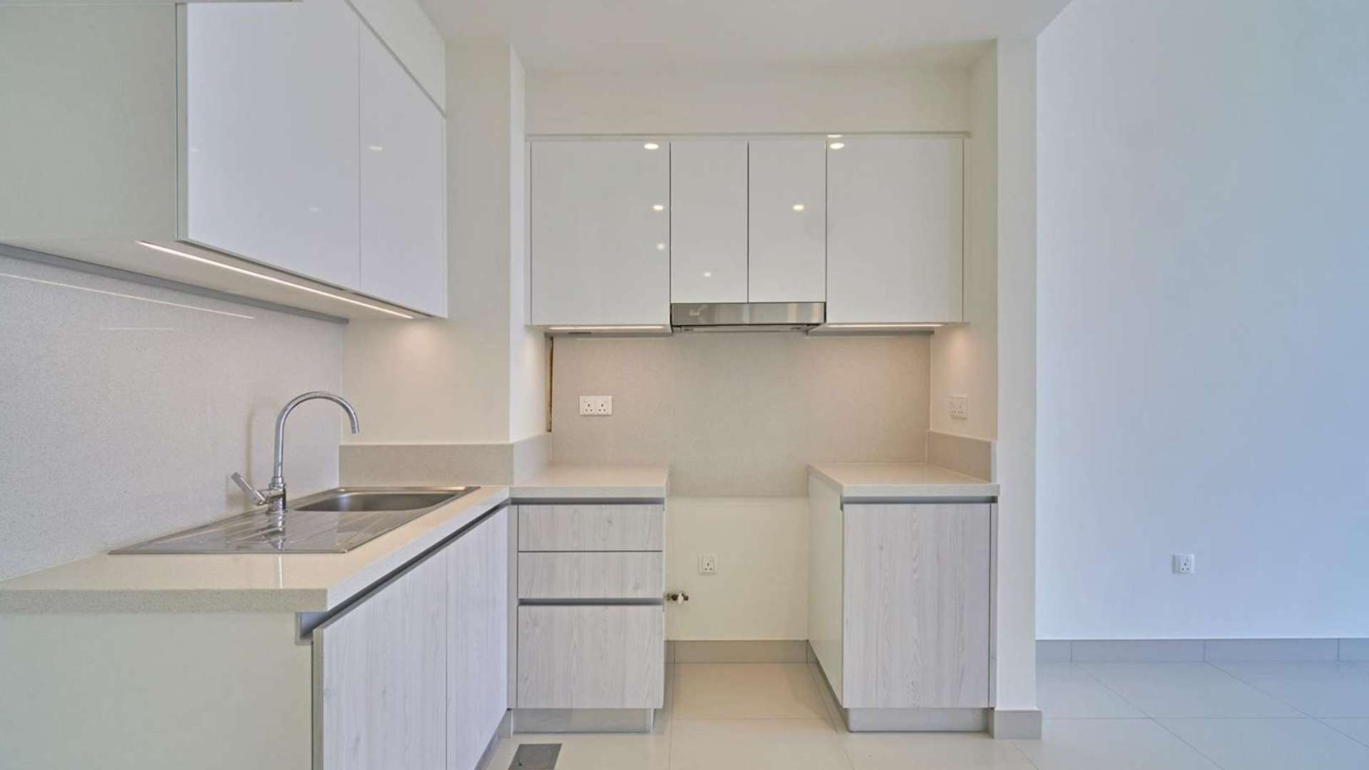 Low-floor 1-bedroom apartment interior with kitchen, large window, Dubai Hills Estate, Park Point