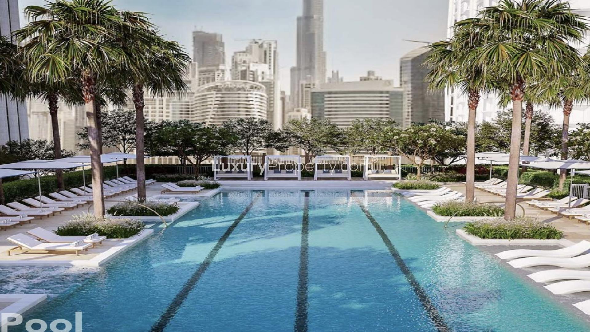 Modern kitchen with city skyline view in Business Bay apartment, Peninsula Four