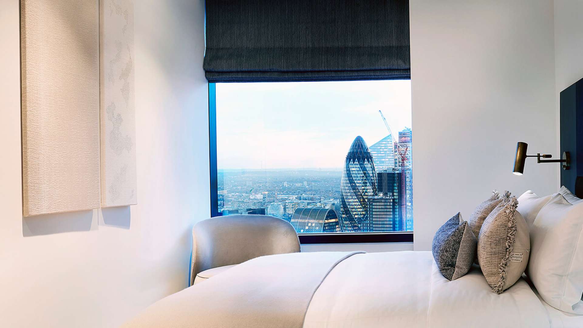 Stylish one-bedroom apartment interior with city views in Principal Tower, London