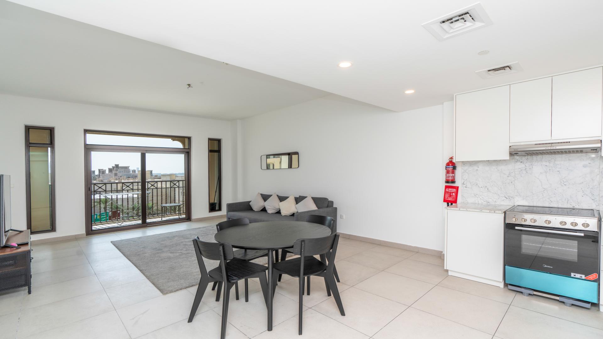 Modern living area in Lamtara 3 apartment, Umm Suqeim, with sleek furnishings and open layout