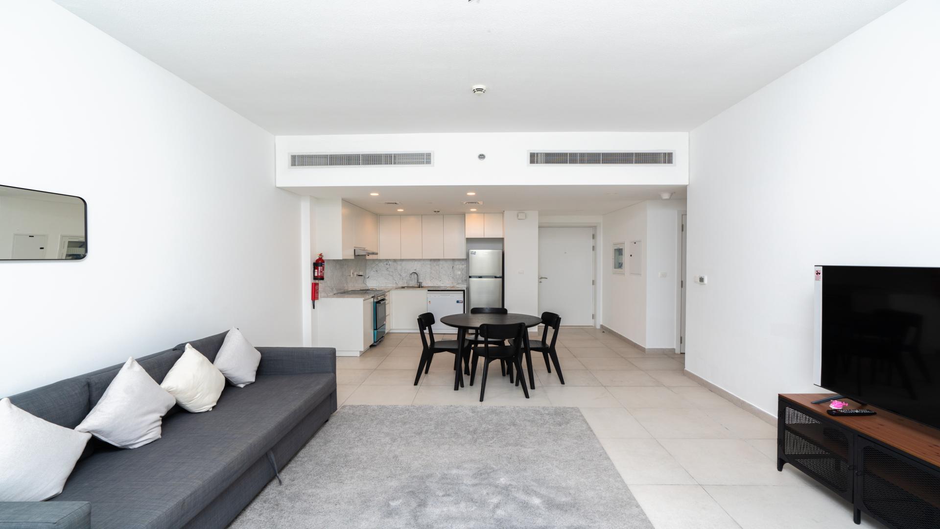 Balcony view from Lamtara 3 apartment in Umm Suqeim, overlooking city skyline and road