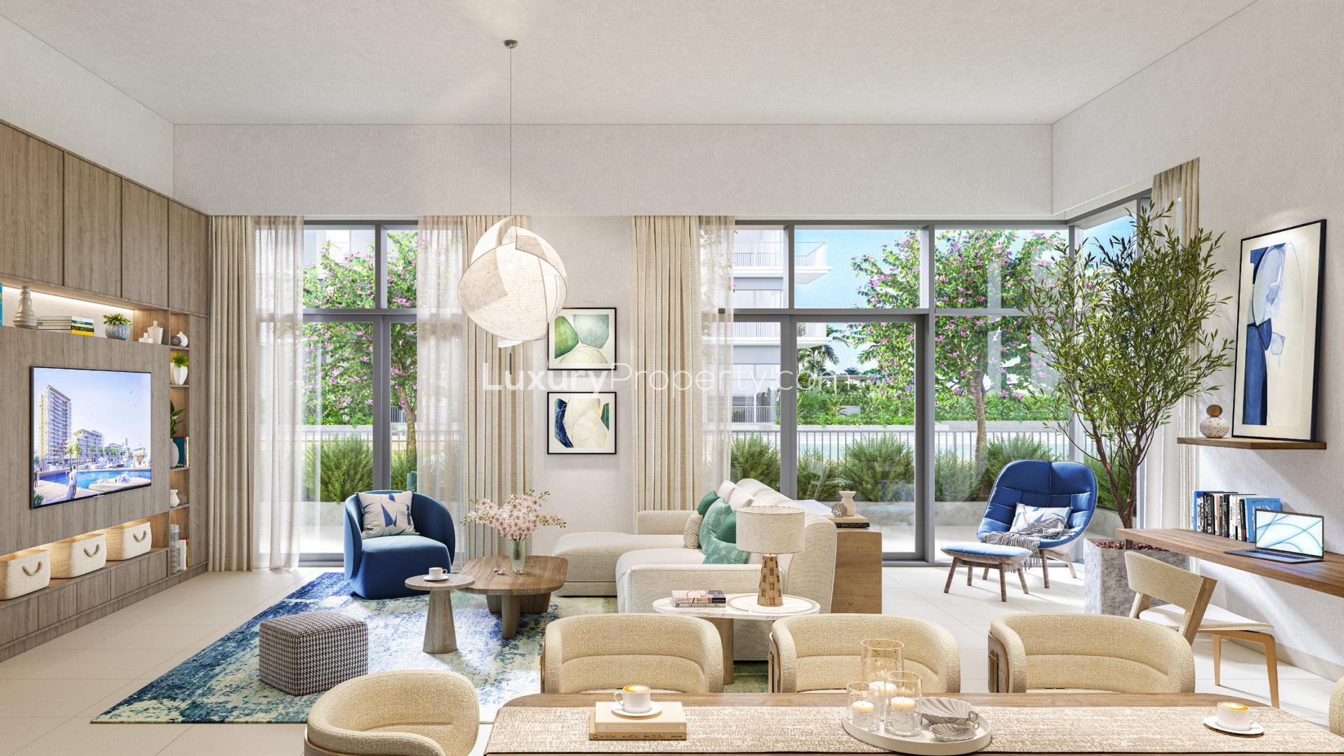 Modern living room and kitchen in Mina Rashid apartment with stunning views