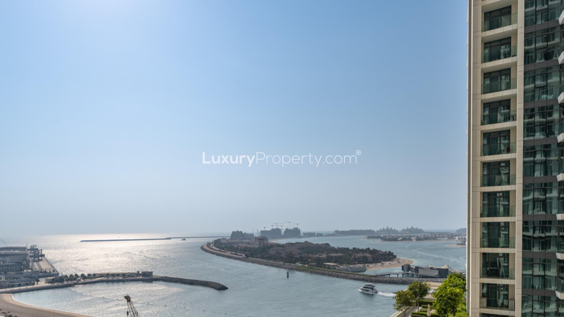 Modern kitchen in 1-bedroom apartment, Emaar Beachfront, Dubai Harbour, with sleek design and amenities