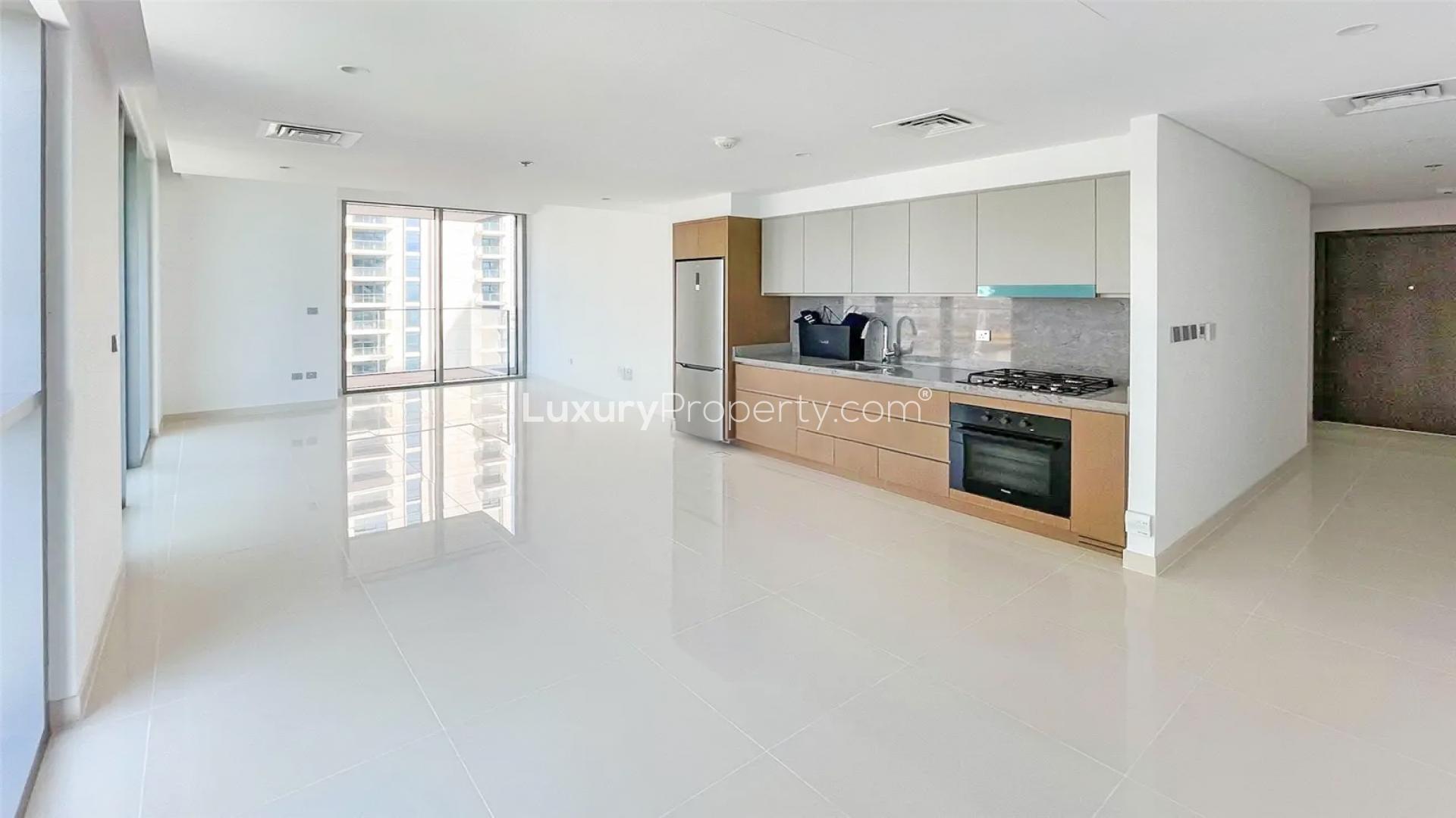 Elegant Dubai Harbour apartment balcony with stunning sea view at Emaar Beachfront