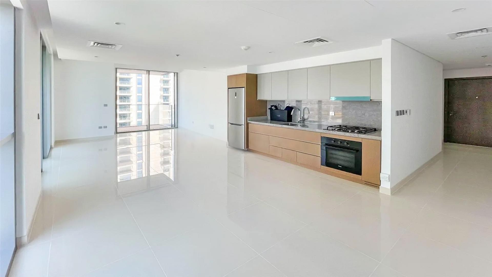 Elegant Dubai Harbour apartment balcony with stunning sea view at Emaar Beachfront