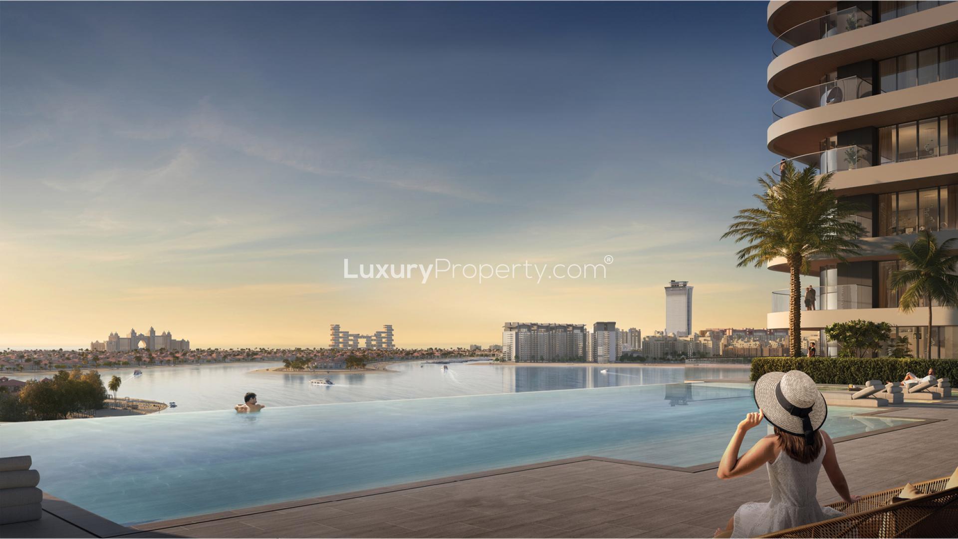 Luxurious rooftop pool with stunning Dubai Harbour views at Emaar Beachfront apartment
