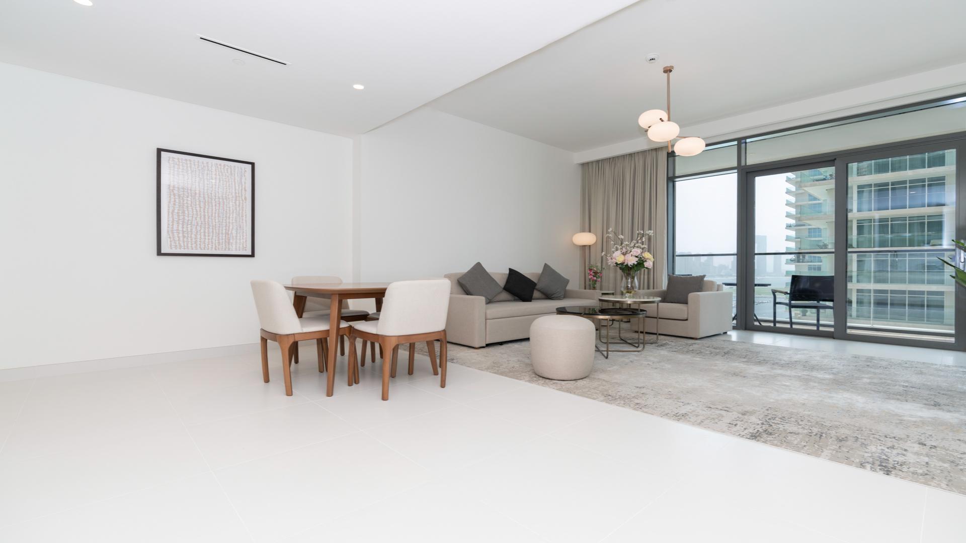 Contemporary living room in South Beach apartment, Dubai Harbour, with modern decor and open layout