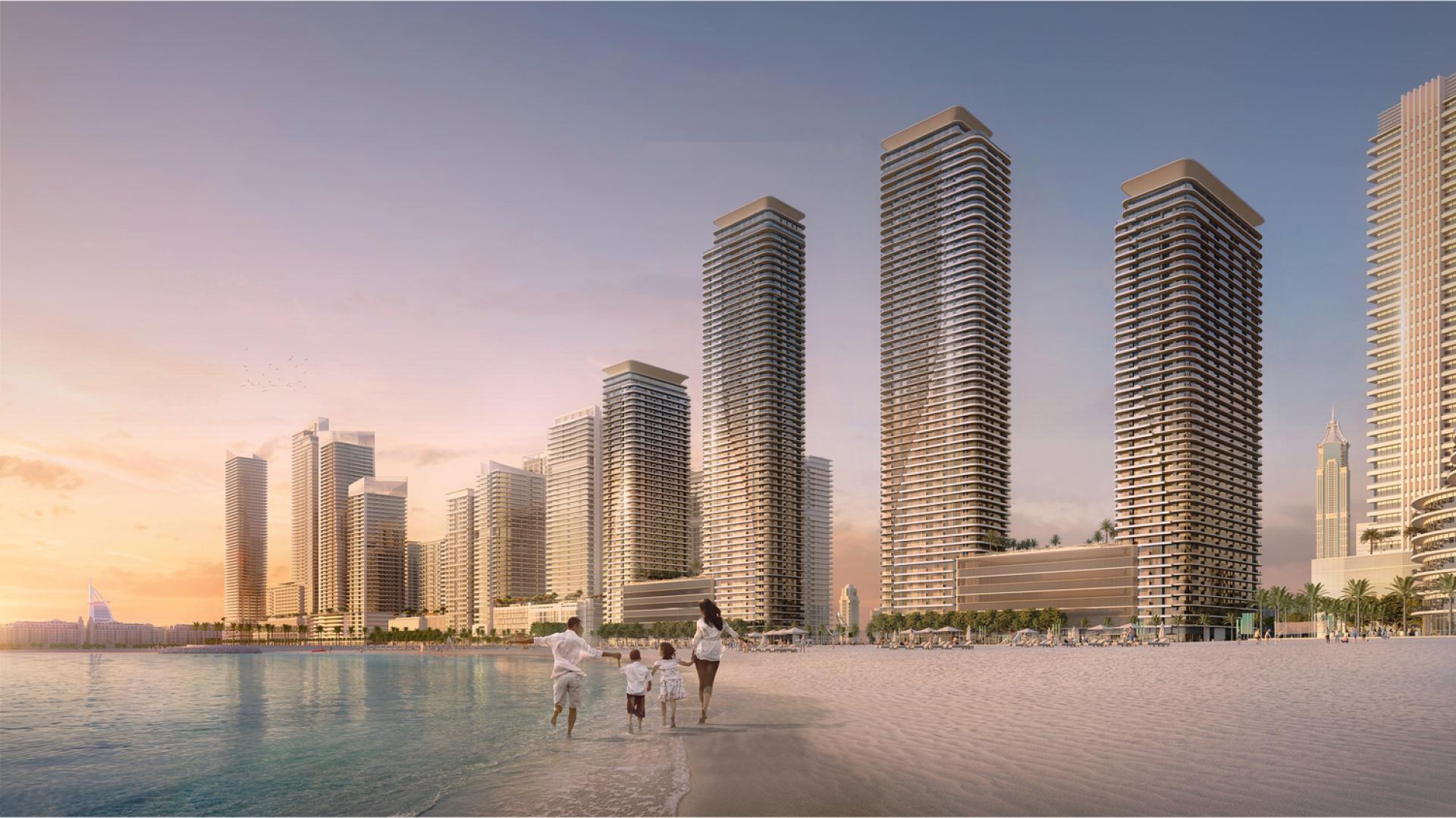 High-floor apartment terrace with infinity pool and stunning Dubai Harbour views at Emaar Beachfront