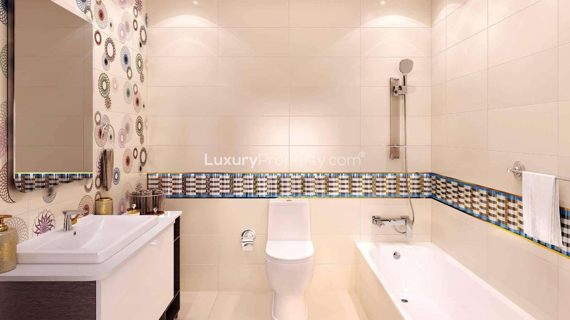 Modern kitchen in one-bedroom apartment, Resortz Arjan, featuring sleek cabinets and appliances