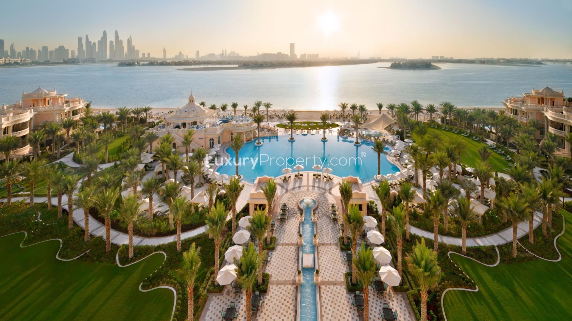 Modern living room in Raffles Residences apartment, Palm Jumeirah, with stylish decor and shelving