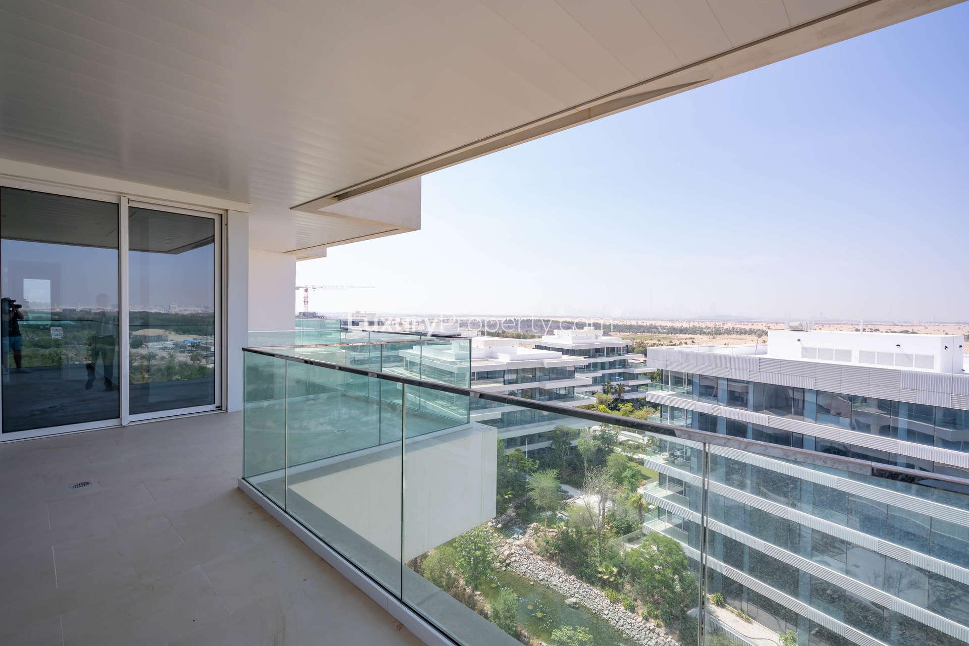 High floor 1BR apartment interior in Seventh Heaven, Al Barari with wooden flooring