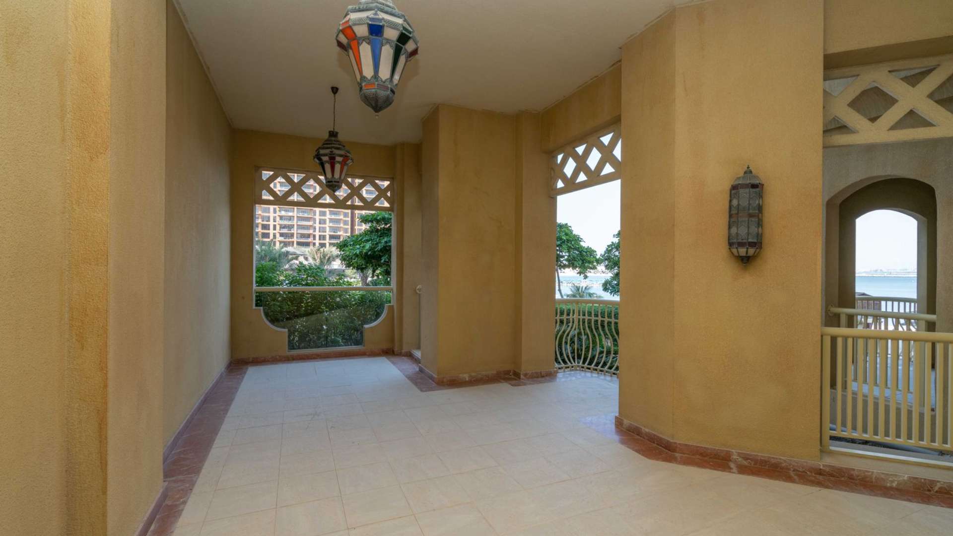 Living room of one-bedroom apartment in Shoreline Residences, Palm Jumeirah, featuring modern decor