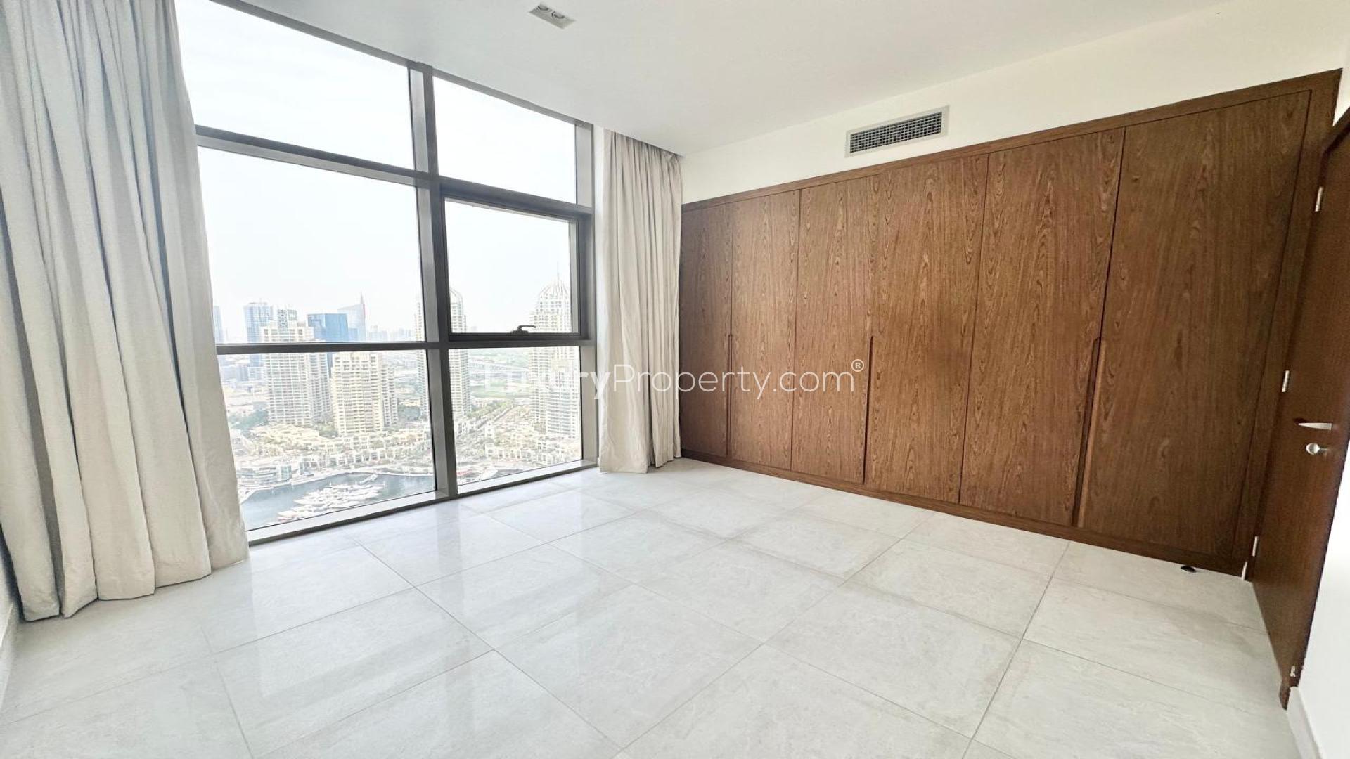 Bright living area in No. 9 apartment, Dubai Marina, with large windows and modern design