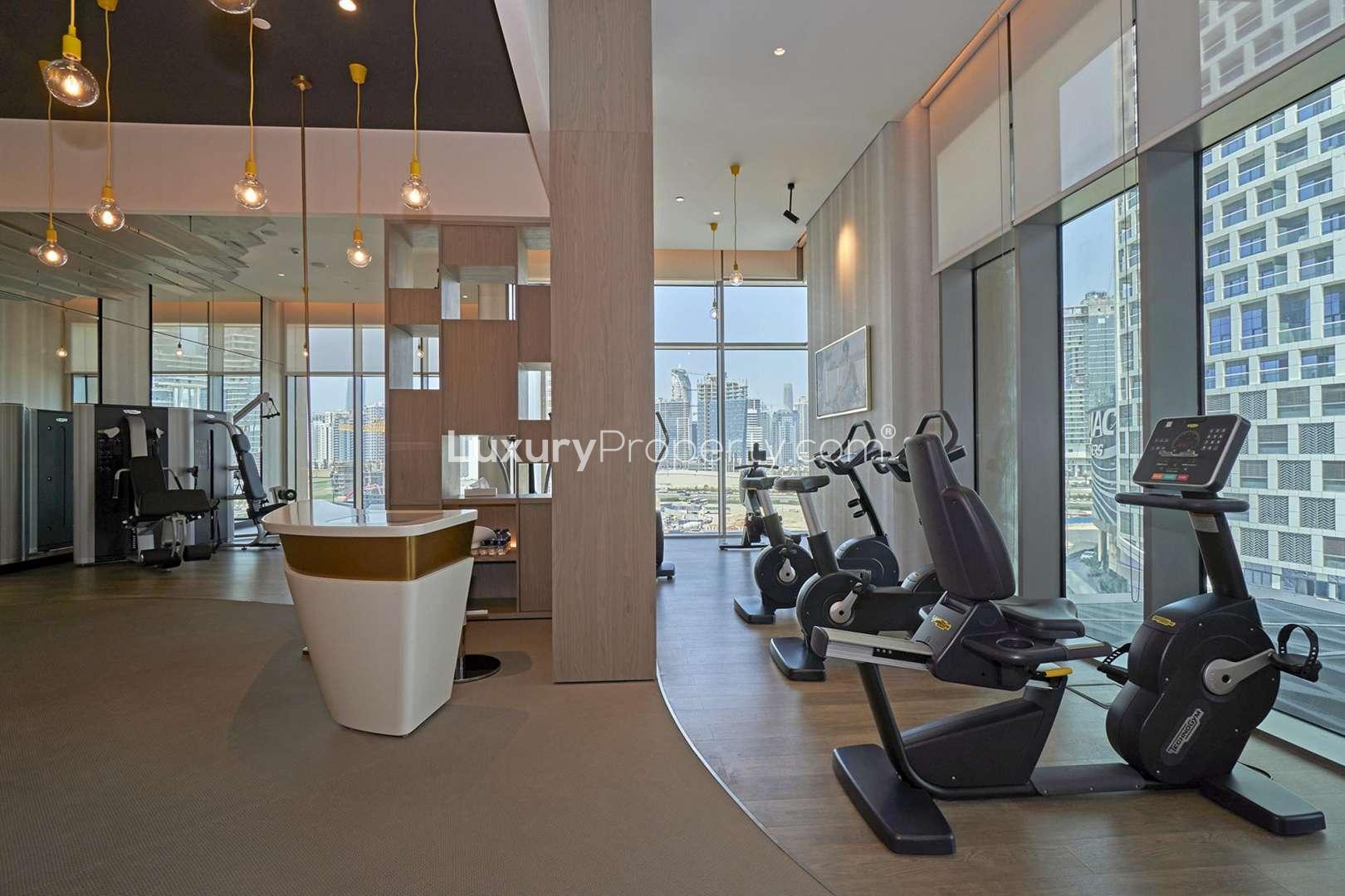 Luxurious pool area at SLS Dubai Residences, Business Bay, with city skyline views